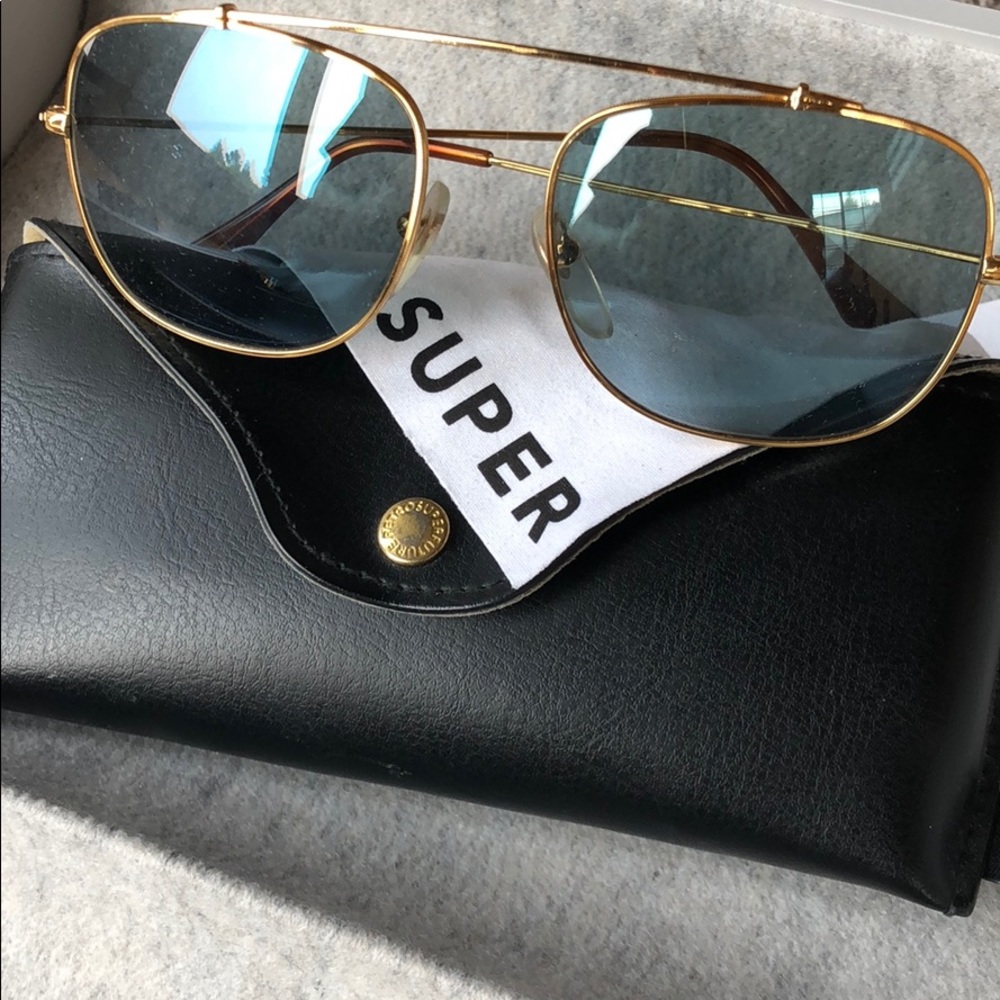 Retro Super Future sunglasses gold and blue frame